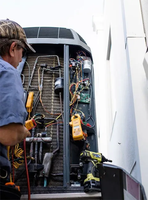 DAT AC Guy technician diagnosing an air conditioning system